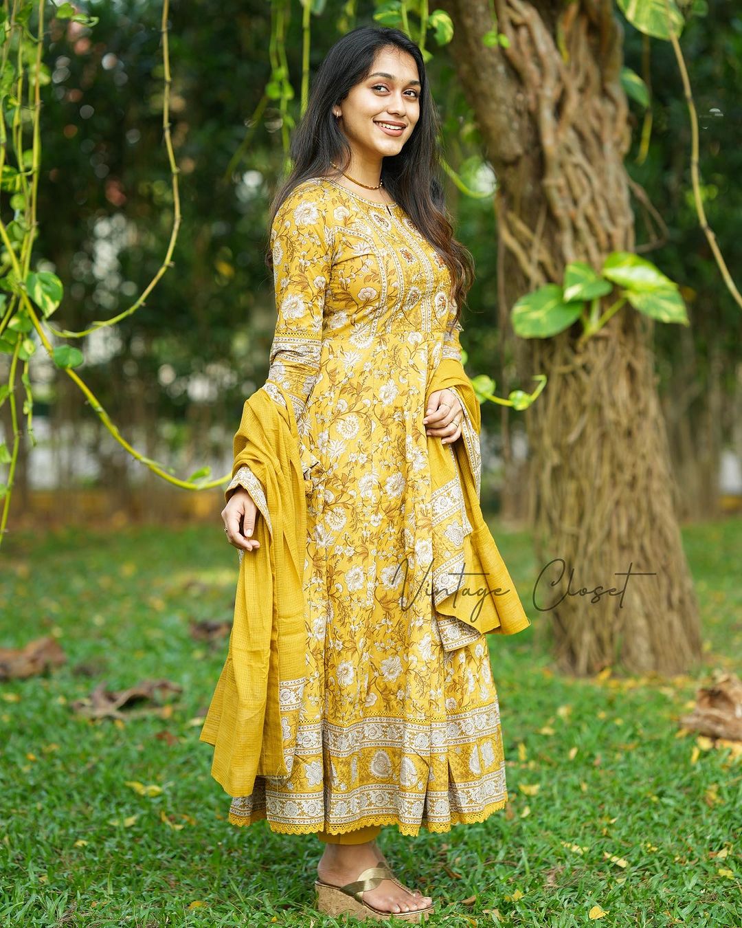 YELLOW VOLUMINOUS ANARKALI SUIT SET