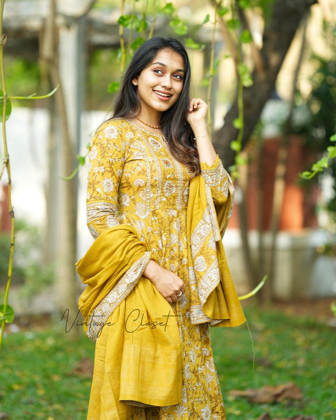 YELLOW VOLUMINOUS ANARKALI SUIT SET