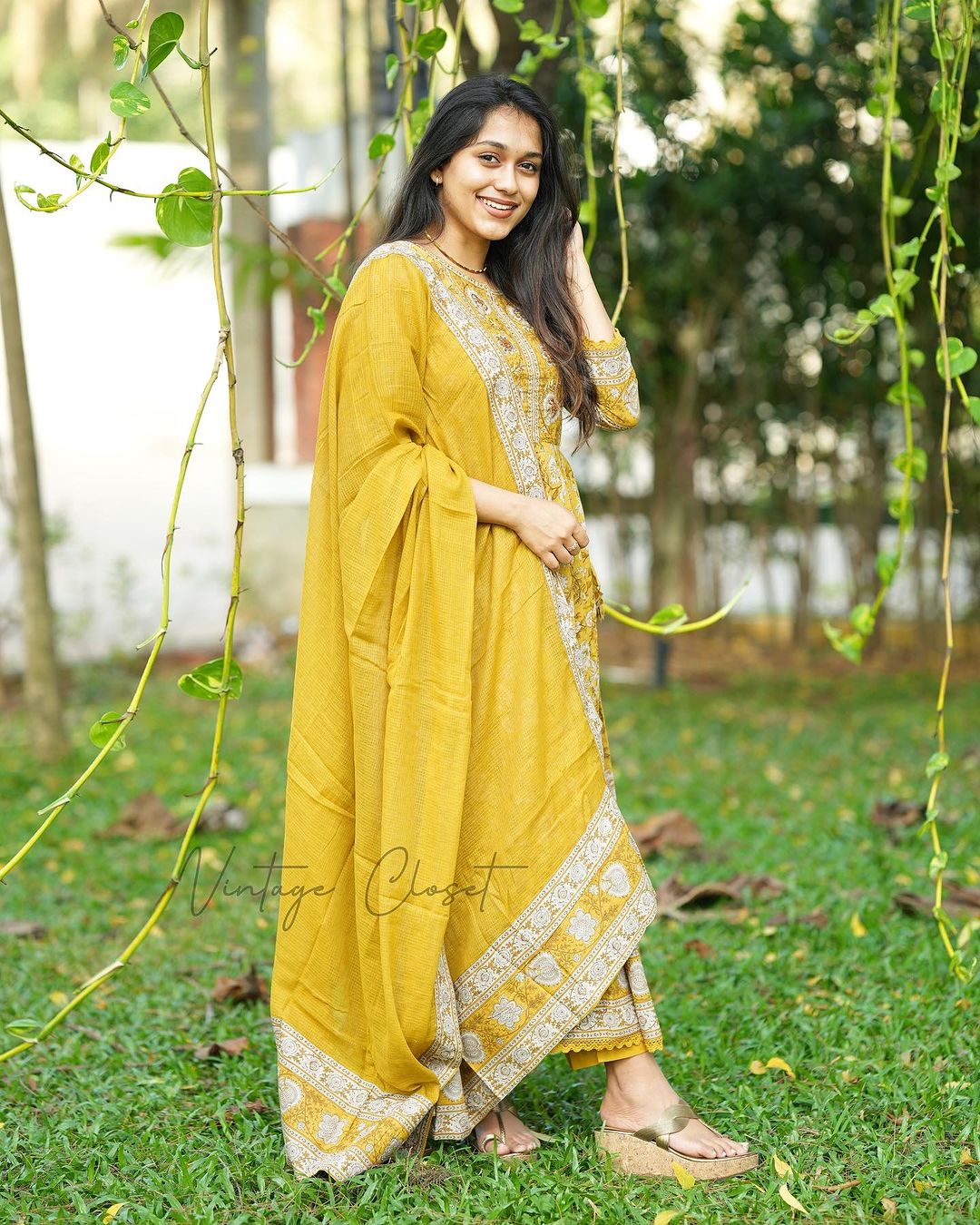 YELLOW VOLUMINOUS ANARKALI SUIT SET