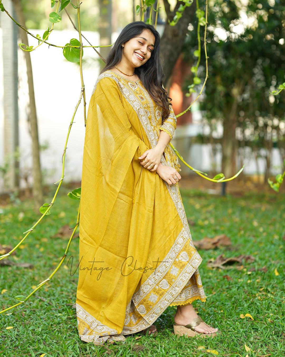 YELLOW VOLUMINOUS ANARKALI SUIT SET