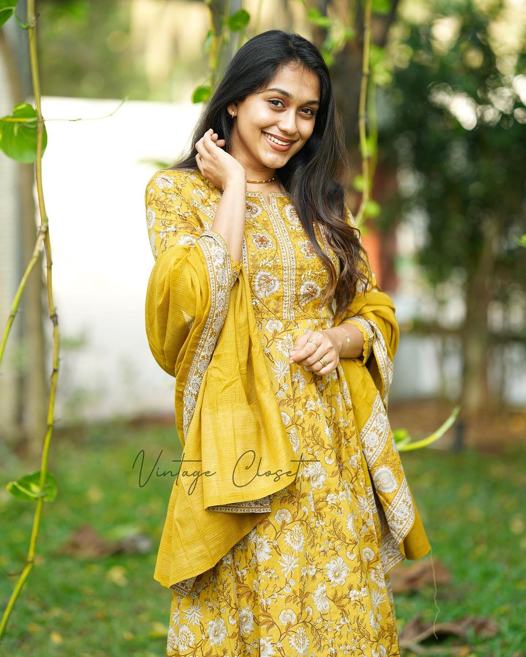 YELLOW VOLUMINOUS ANARKALI SUIT SET